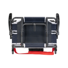 Underside of the red/white/indigo big comfort stadium chair with armrests with the l-hook closed.