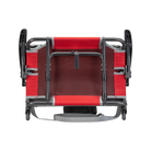 Underside of the red/gray big comfort stadium chair with armrests with the l-hook closed.