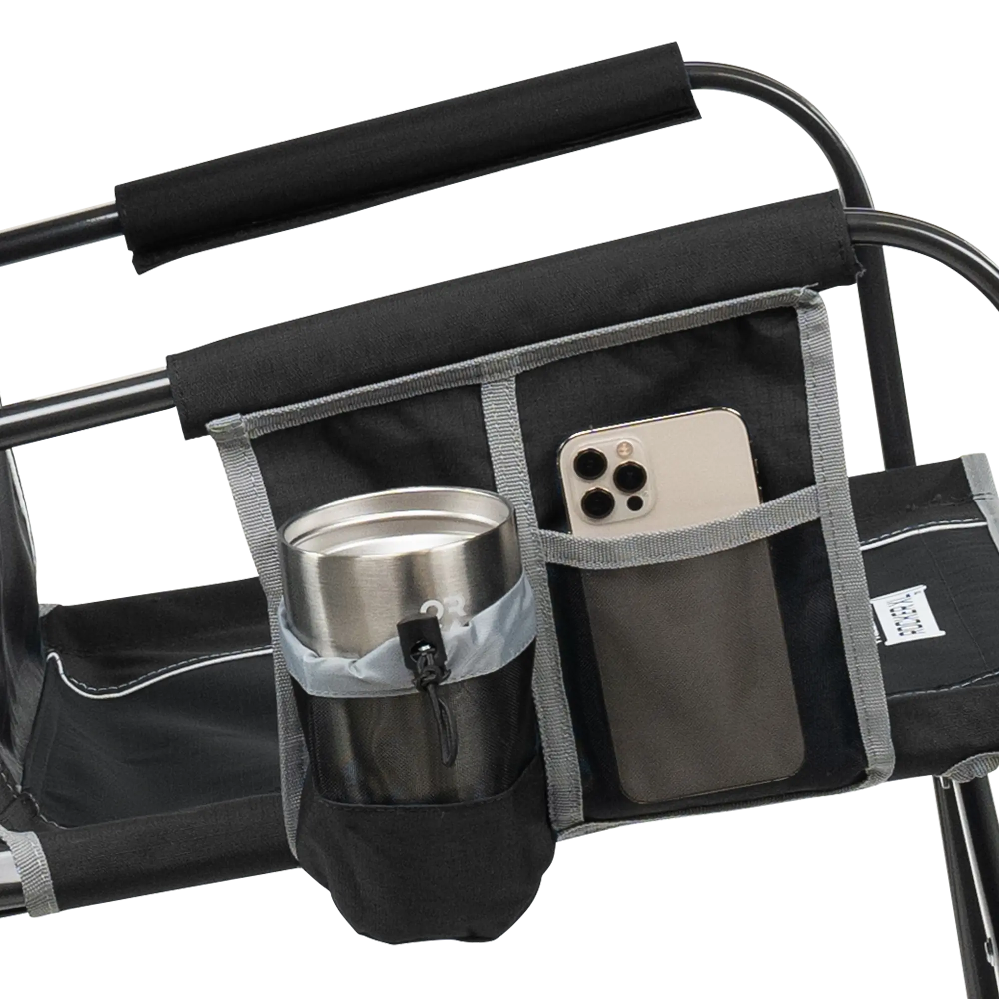 Black GCI Outdoor Freestyle Rocker XL side pocket holding a tumbler and smartphone.
