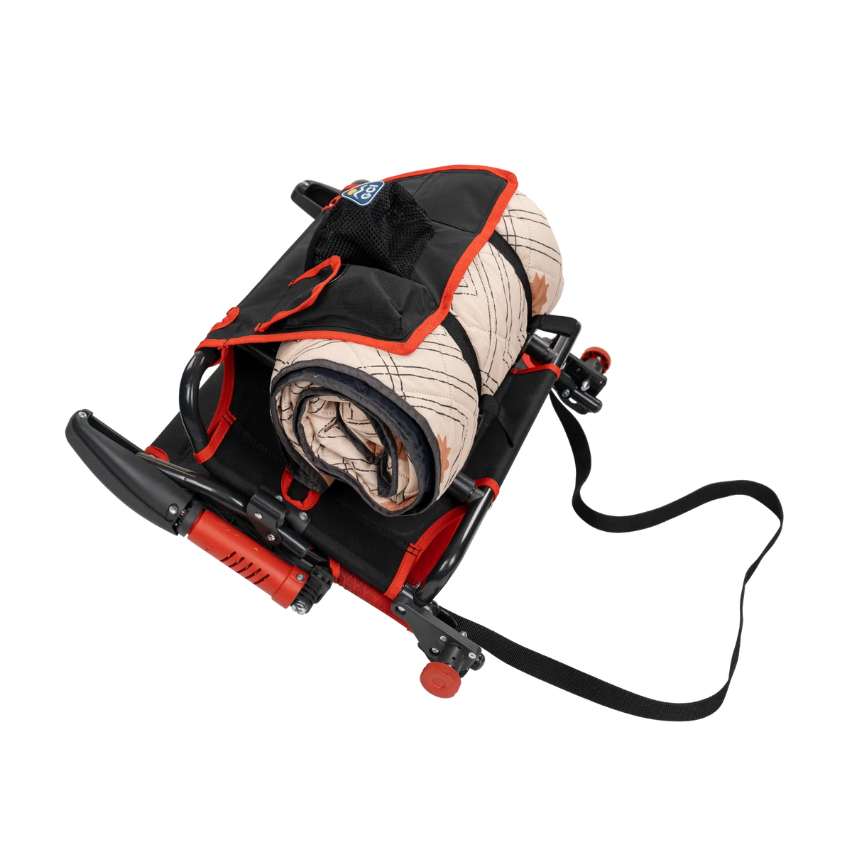 A rolled blanket stored in the pack & port caddy on the folded redline fade Stadium Rock-Cliner 2.0.