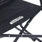 Black camping chair with 'Freestyle Rocker' branding on a white background