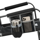 Black GCI Outdoor Freestyle Rocker XL side pocket holding a tumbler and smartphone.