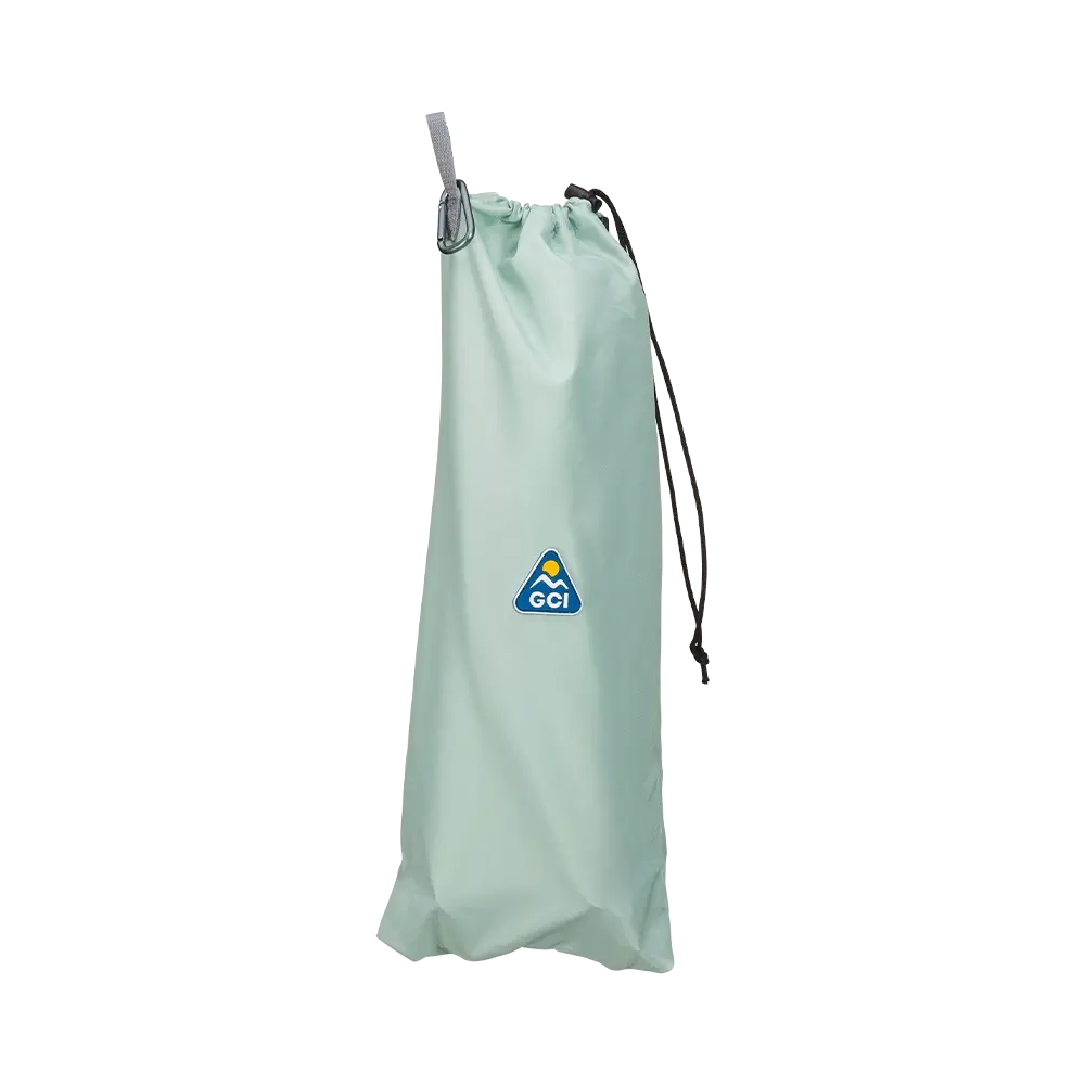 A pastel green sunshade accessory inside a storage bag. 