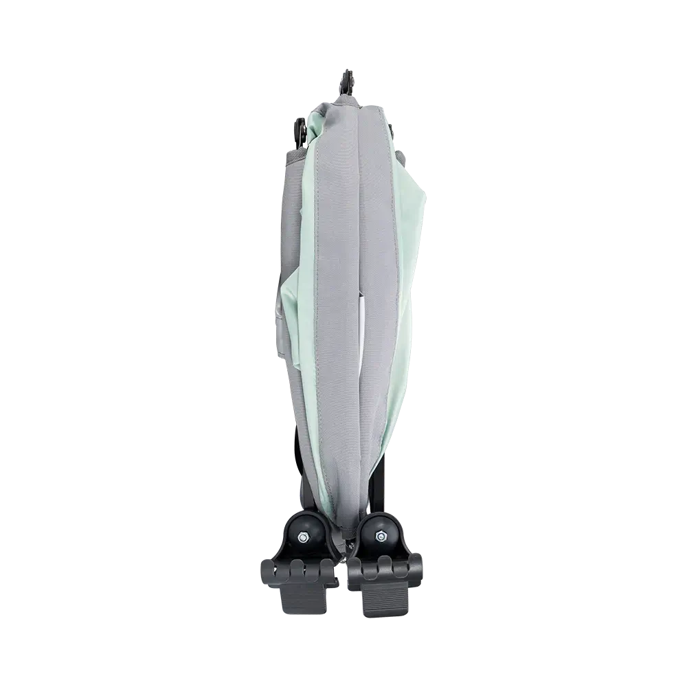 A folded angle of the pastel green sunshade accessory. 