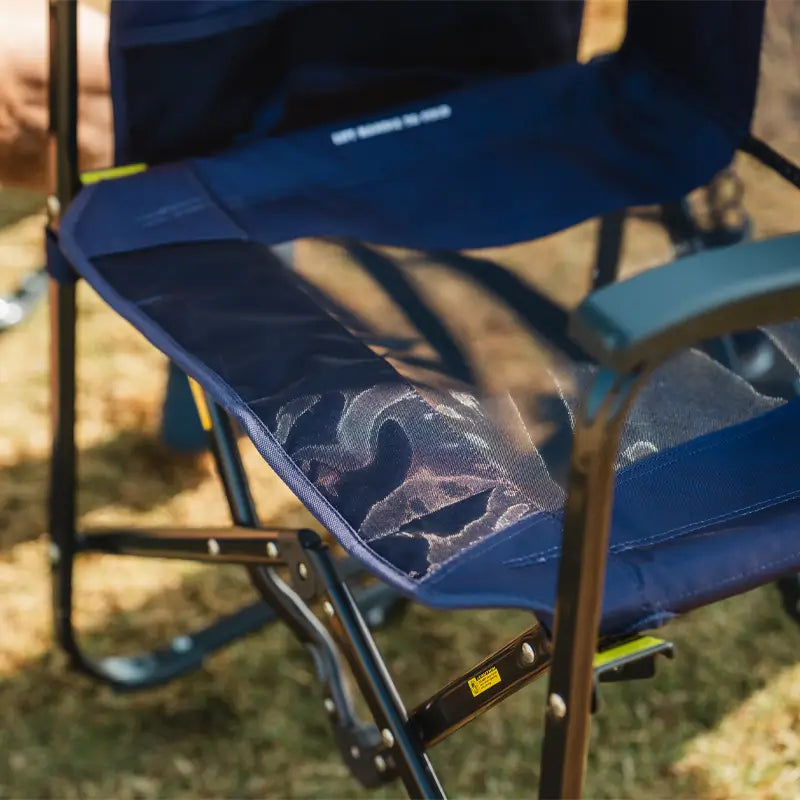 Close-up of the mesh seat on an empty Adjustable Rocker chair, highlighting breathable fabric and build quality.