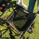 Close-up of the mesh seat pocket on the Black Breeze Rocker holding small personal items.