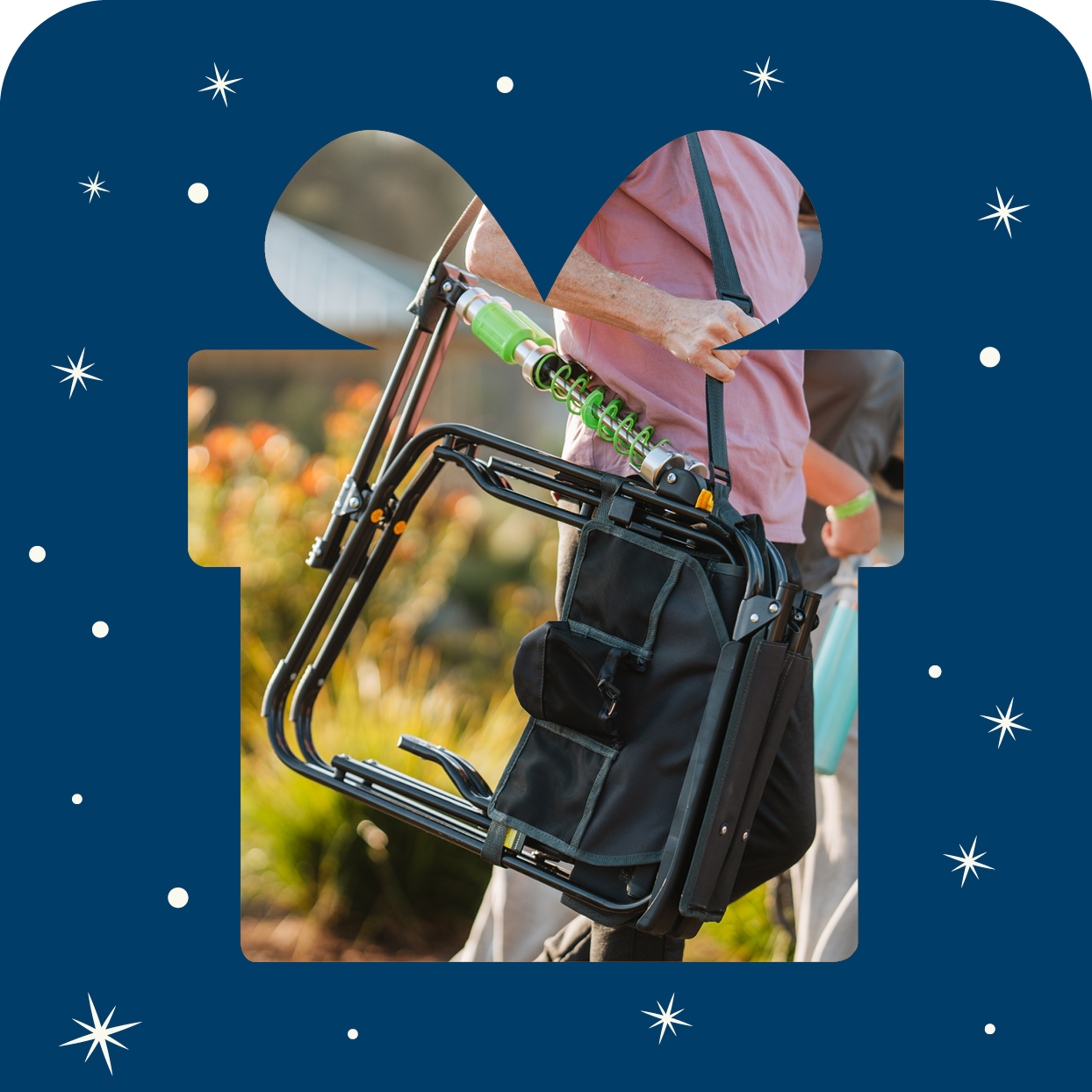 A gift box shaped outline with a stowaway rocker inside the gift. 