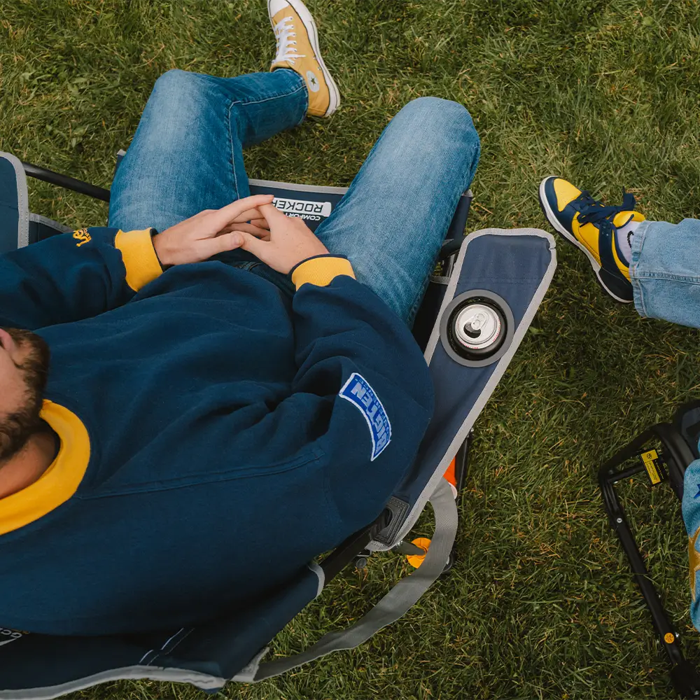 A couple sitting and talking n their comfort pro rockers.  