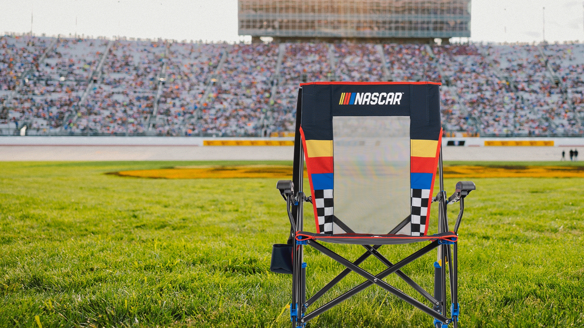 Different GCI chairs from the NASCAR collection in front of a racetrack. 