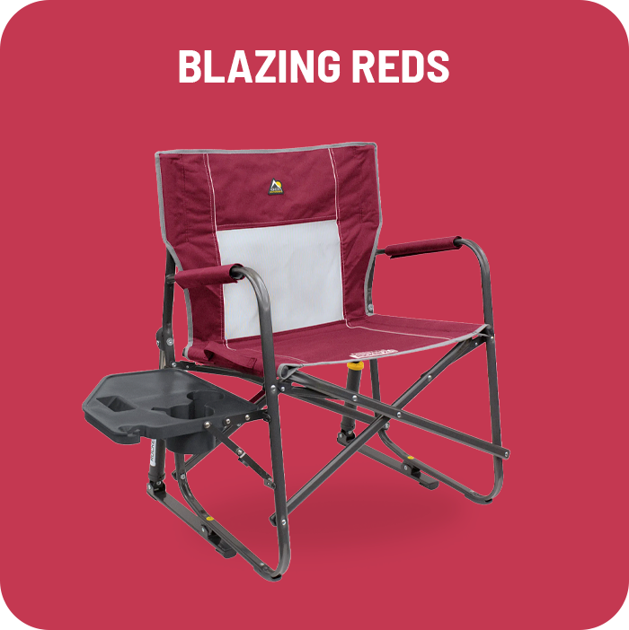 A cinnamon freestyle rocker xl with side table with "Blazing Reds" text above it. 
