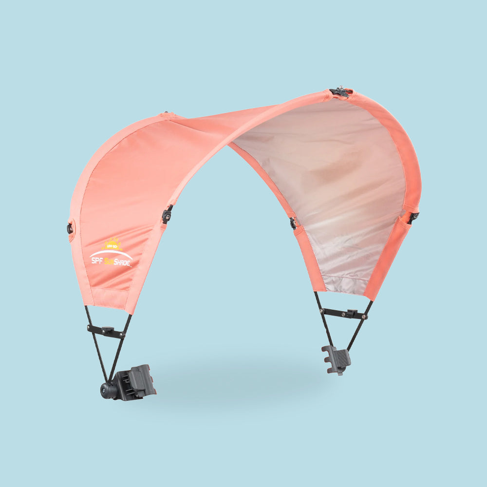 A coral Sunshade Accessory in front of a blue background. 