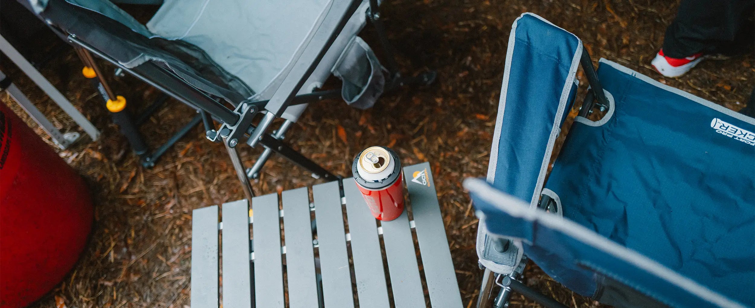 A group of GCI products positioned on a mulch bed next to a group of tailgaters. 