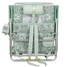 Backpack straps of the folded Backpack Beach Chair in floral pastel green print.