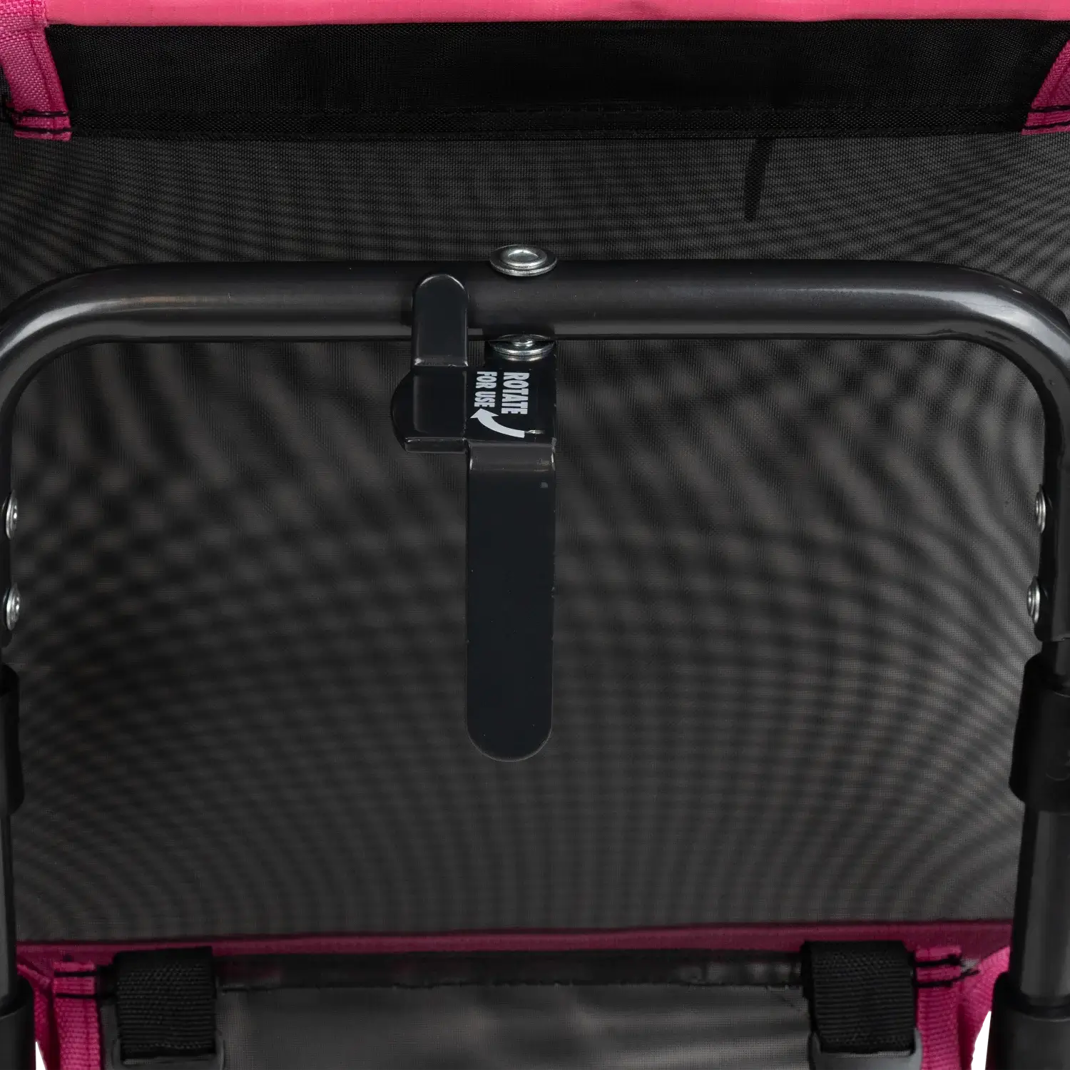 Close-up of the L-hook underneath the sport pink Big Comfort Stadium Chair 2.0.