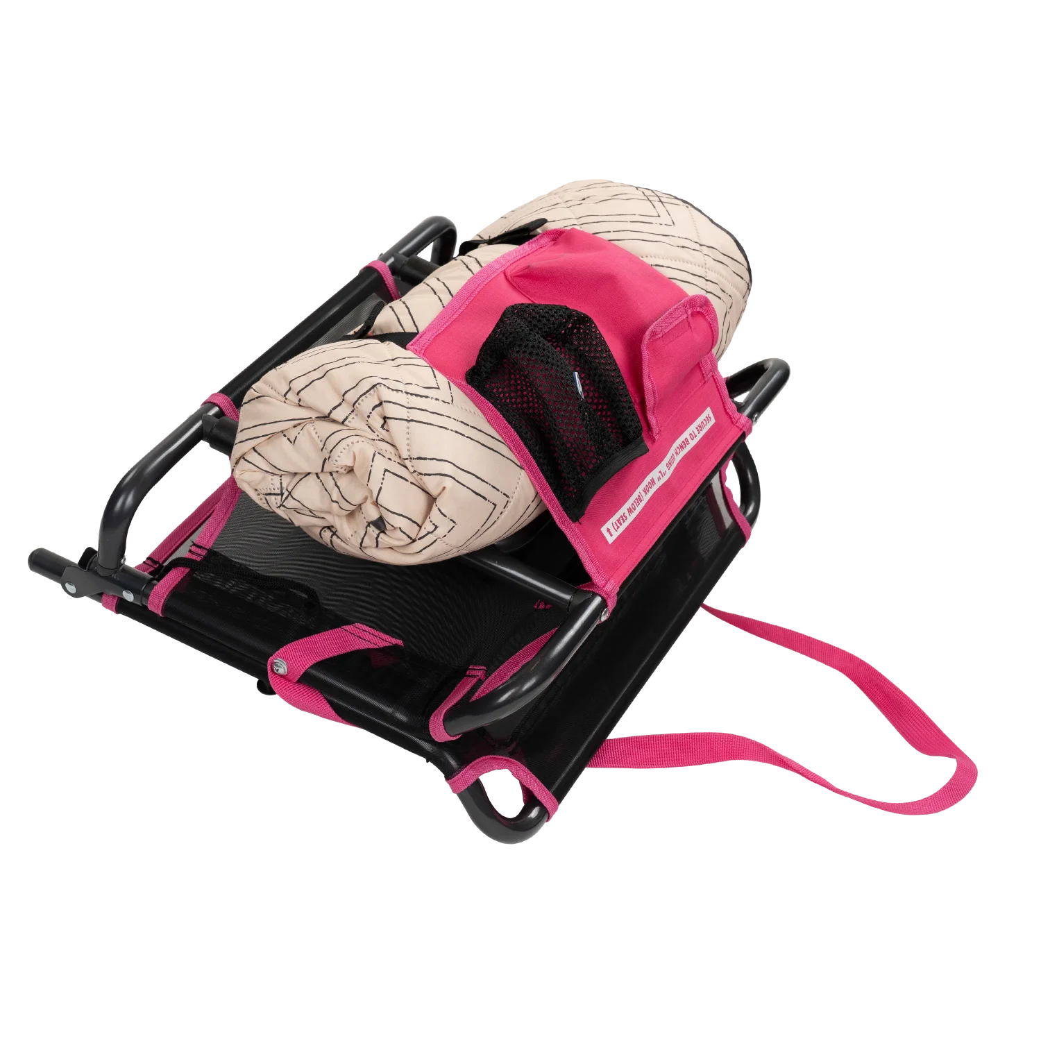 A rolled blanket stored in the pack & port caddy on the folded sport pink Big Comfort Stadium Chair 2.0.