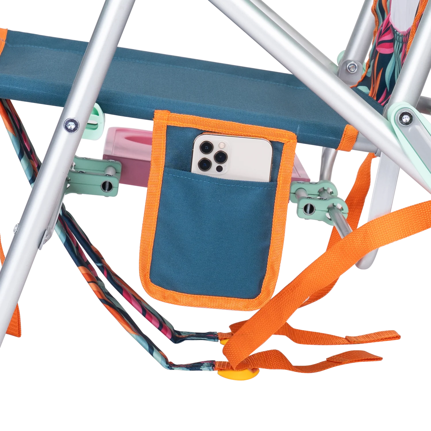 Up-close of the phone holder pocket on the Big Surf with Slide Table in tropical escape print.
