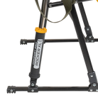 Close-up of the Spring-Action shocks on the heathered olive Comfort Pro Rocker XL.