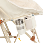 Close up view of the beverage holder and phone pocket on the natural Fleece Rocker.