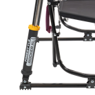 Close-up of the Spring-Action shocks on the berry Freestyle Rocker XL with Side Table.