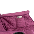 Close up view of the phone holder pocket on the berry Kickback Insulated Rocker.