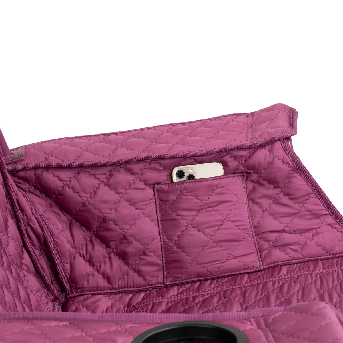 Close up view of the phone holder pocket on the berry Kickback Insulated Rocker.