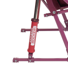 Close up view of the Spring-Action shocks on the berry Kickback Insulated Rocker.