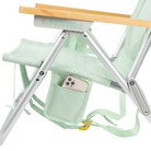 Close-up of the phone holder pocket on the TidalDrift lounger in pastel green mosaic.