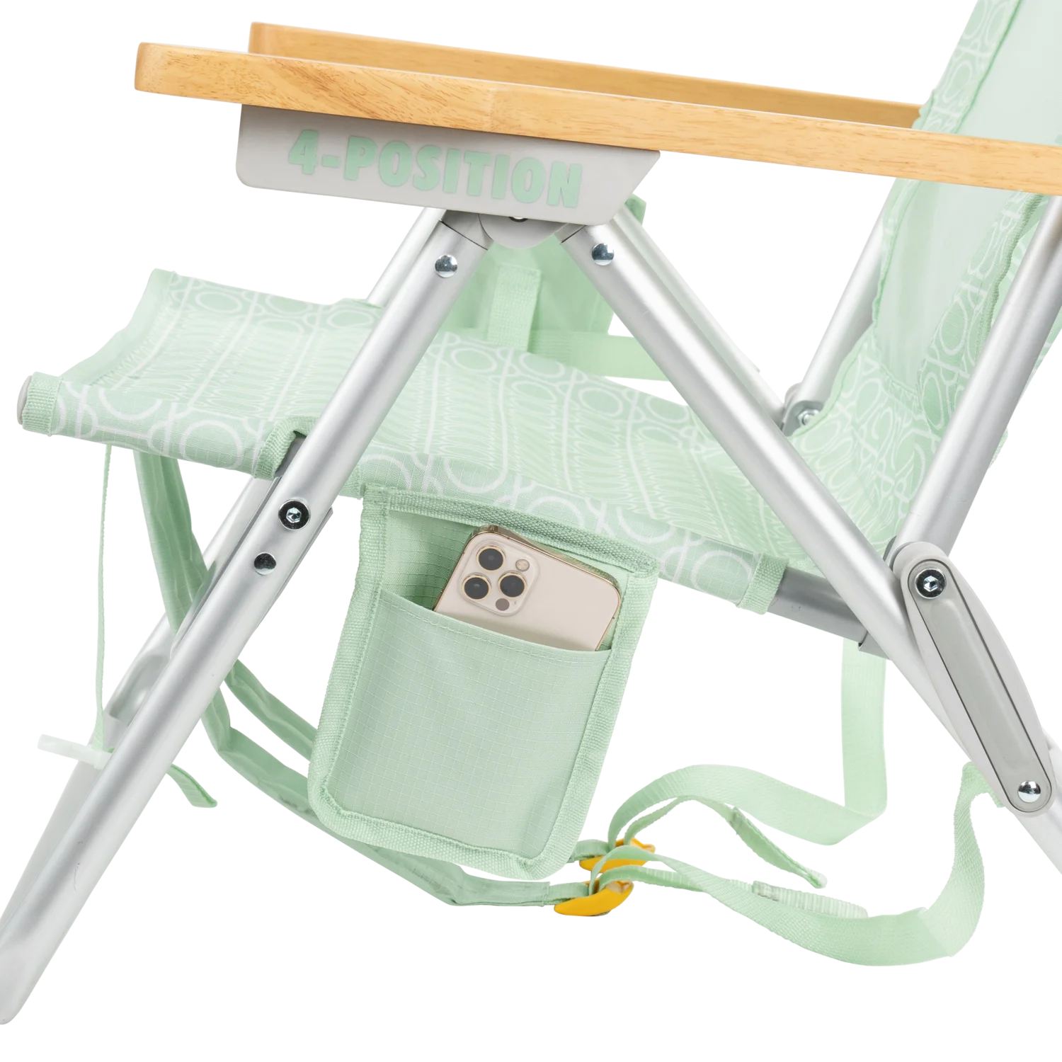 Close-up of the phone holder pocket on the TidalDrift lounger in pastel green mosaic.